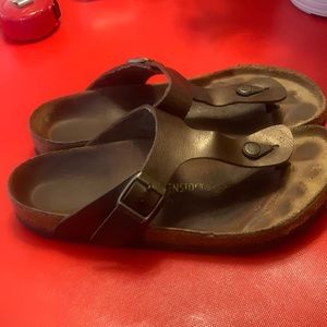 Birkenstock Gizeh birko-flor golden brown sandals.